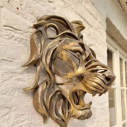 Scultura testa di leone da parete