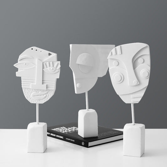 Scultura volto e fiore
