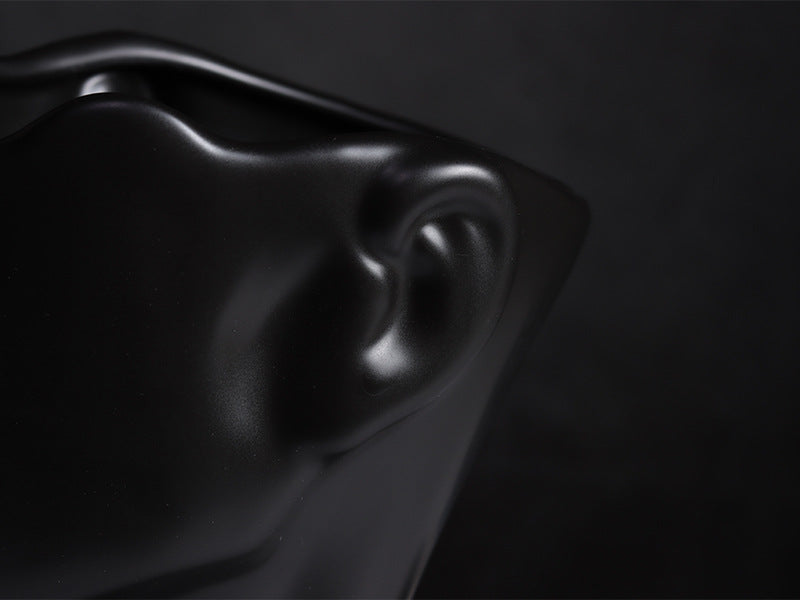 Scultura ceramica volto