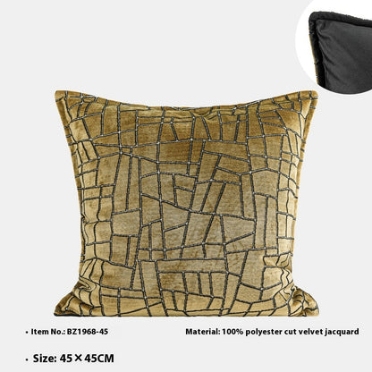 Cuscino geometrico oro