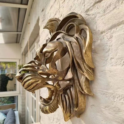 Scultura testa di leone da parete