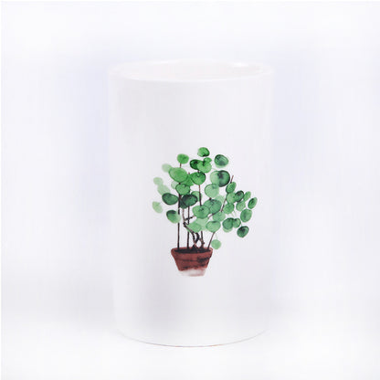 Tazze bianche con piante disegnate