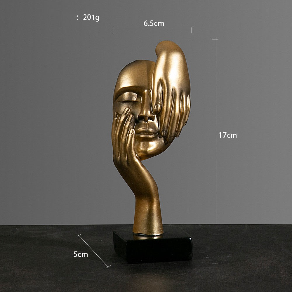 Sculture volti dorate emozioni tre