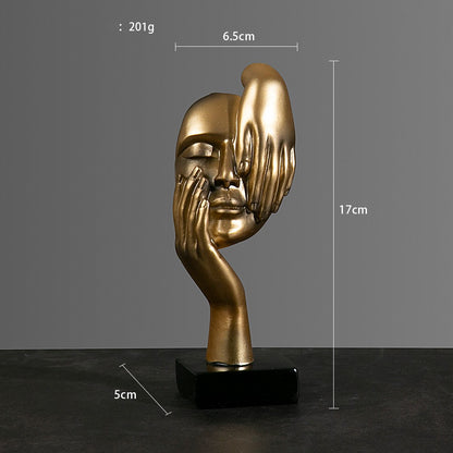 Sculture volti dorate emozioni tre