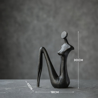 Scultura figura nera astratta lucida