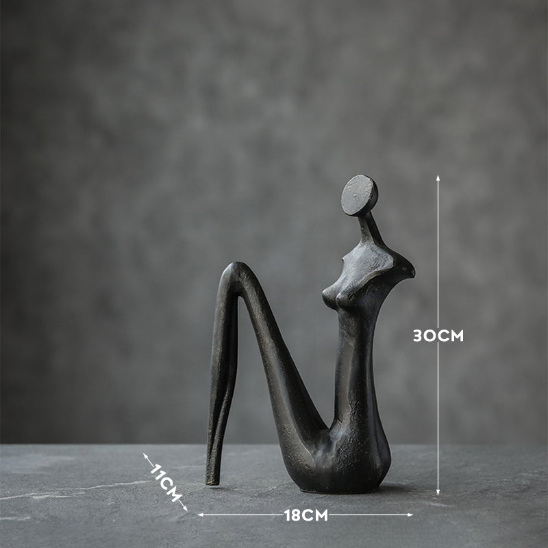 Scultura figura nera astratta lucida