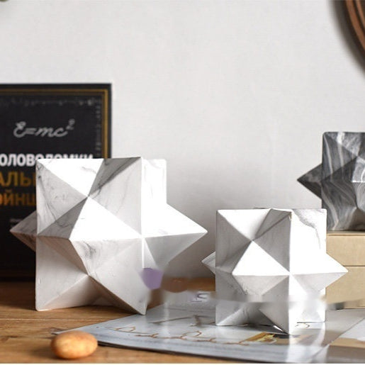 Stella geometrica in marmo