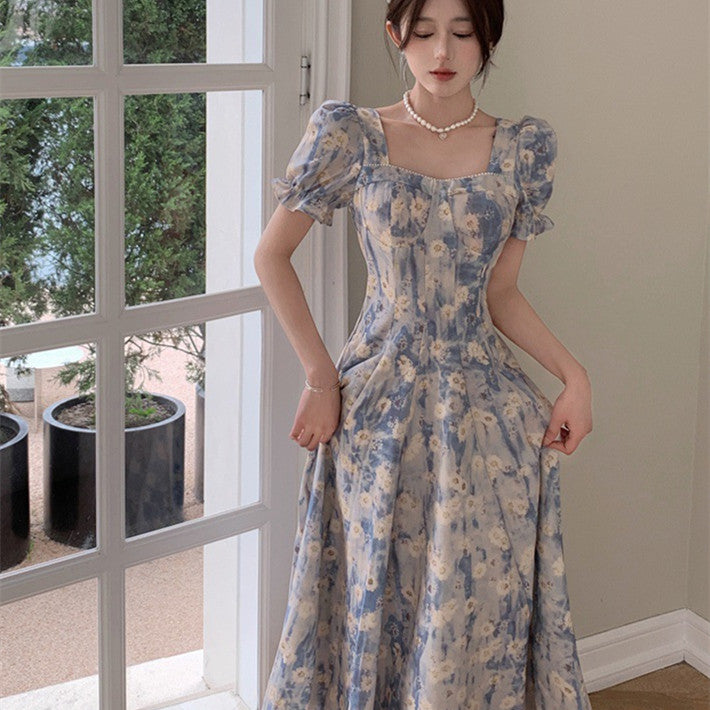 Vestito blu floreale