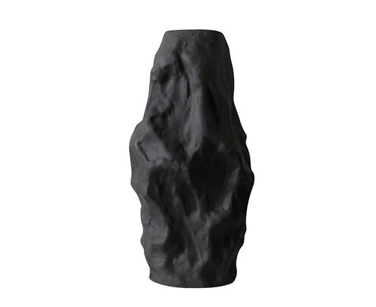 Vaso nero con superficie irregolare