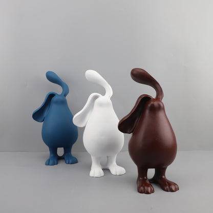 Sculture conigli marrone bianco blu