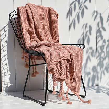 Coperta maglia con nappe