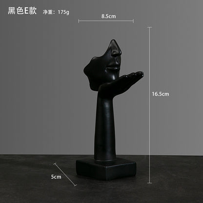 Sculture volti dorate emozioni tre