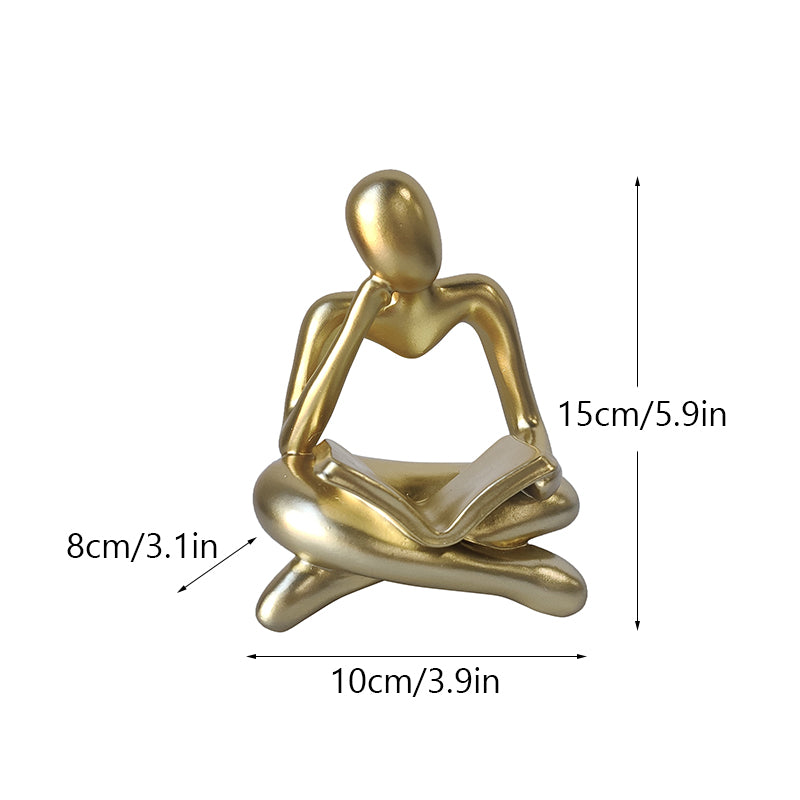 Statuetta lettura resina