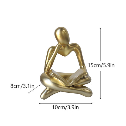 Statuetta lettura resina