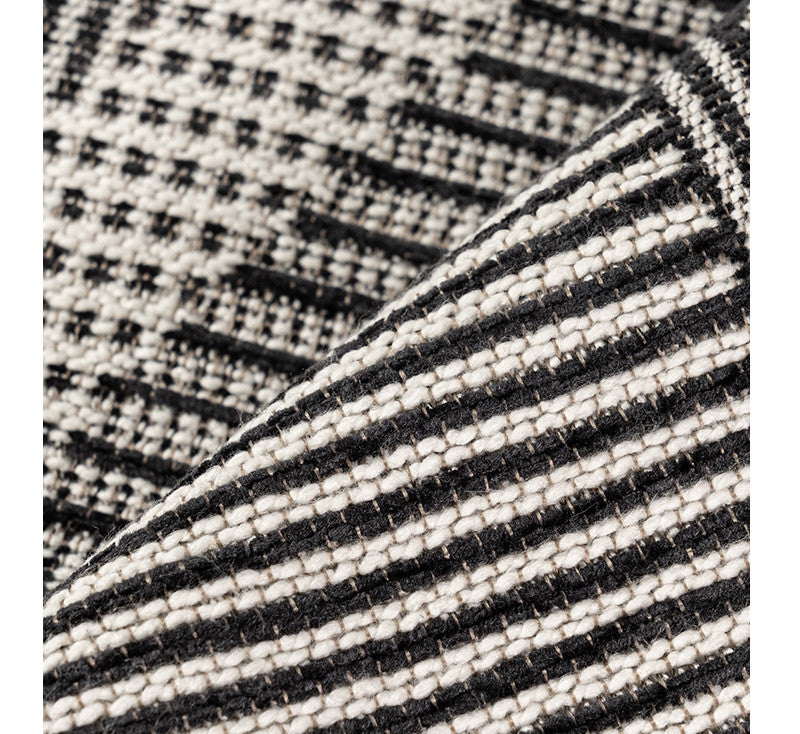 Cuscino grigio-nero astratto