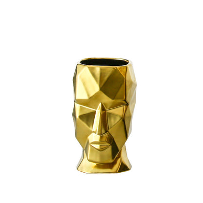 Vaso volto dorato