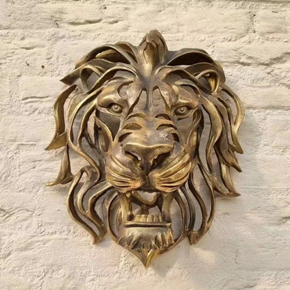 Scultura testa di leone da parete