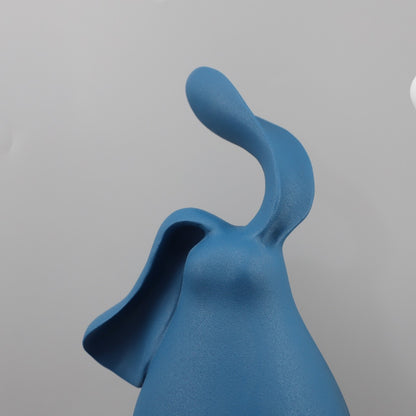 Sculture conigli marrone bianco blu