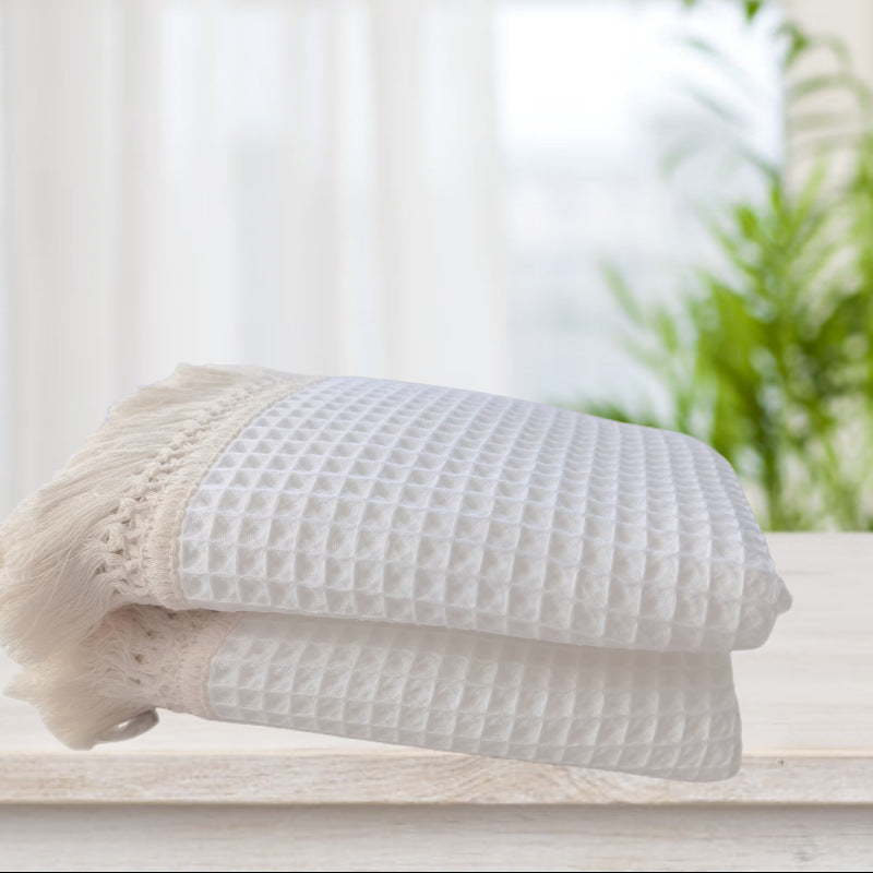 Coperta con nappine