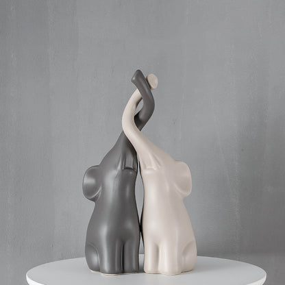 Coppia di elefanti in ceramica