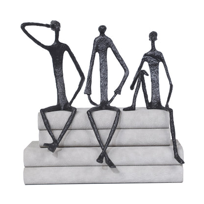 Scultura ferro uomo seduto